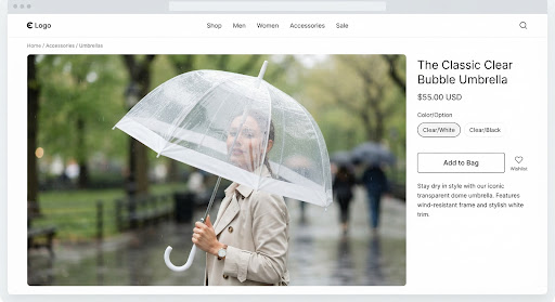 A premium reverse umbrella displayed on a clean light studio background with a visible C-shaped handle and inverted canopy structure for automotive and commuting use.